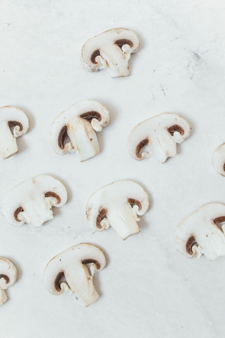 Sliced Mushrooms on White Surface